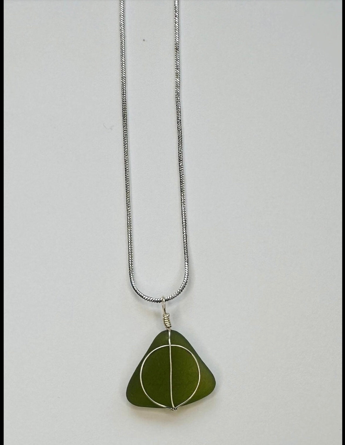 For fans of “the Boy Who Lived” sea glass necklace